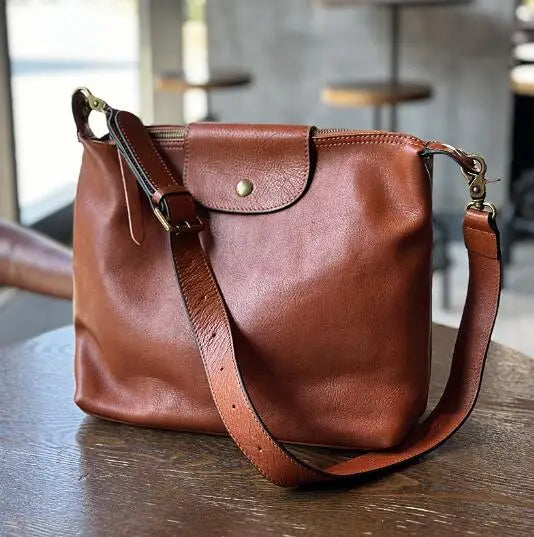 2026 Vintage vegetable tanned cowhide women's bag Leather single shoulder crossbody casual large capacity holiday bag