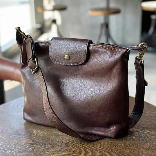 2026 Vintage vegetable tanned cowhide women's bag Leather single shoulder crossbody casual large capacity holiday bag