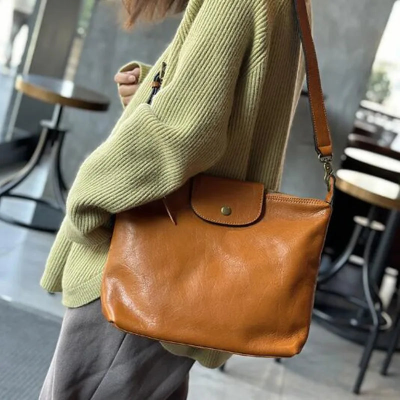 2026 Vintage vegetable tanned cowhide women's bag Leather single shoulder crossbody casual large capacity holiday bag