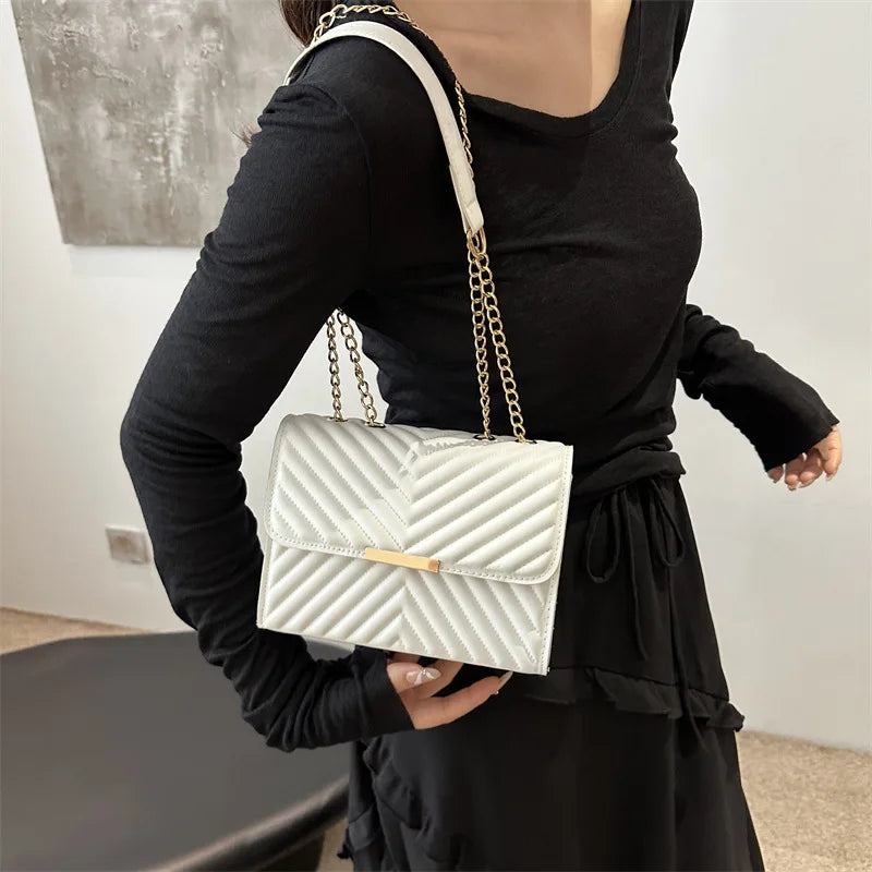 Fashion indentation shoulder bag simple chain 2024 summer new style this year popular retro commuter crossbody small square bag